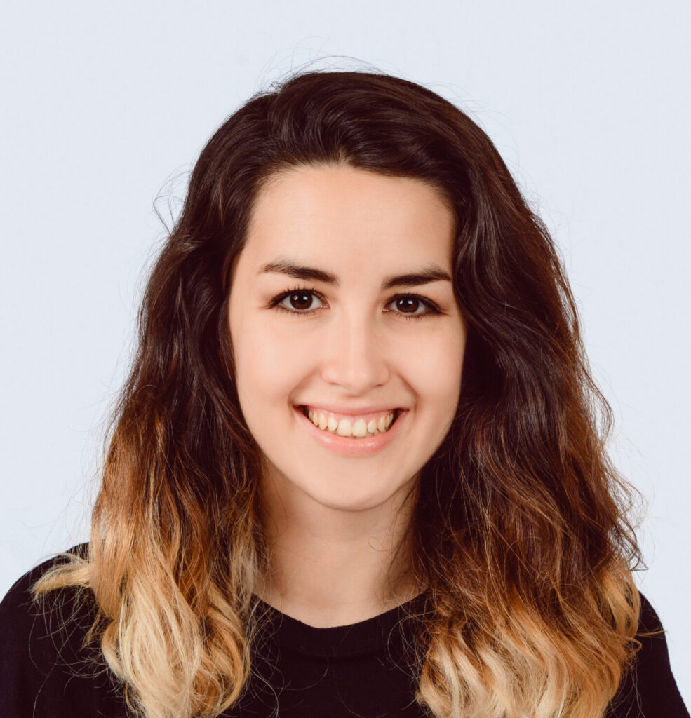 Portrait of attractive young latin woman in a studio. Isolated white background.